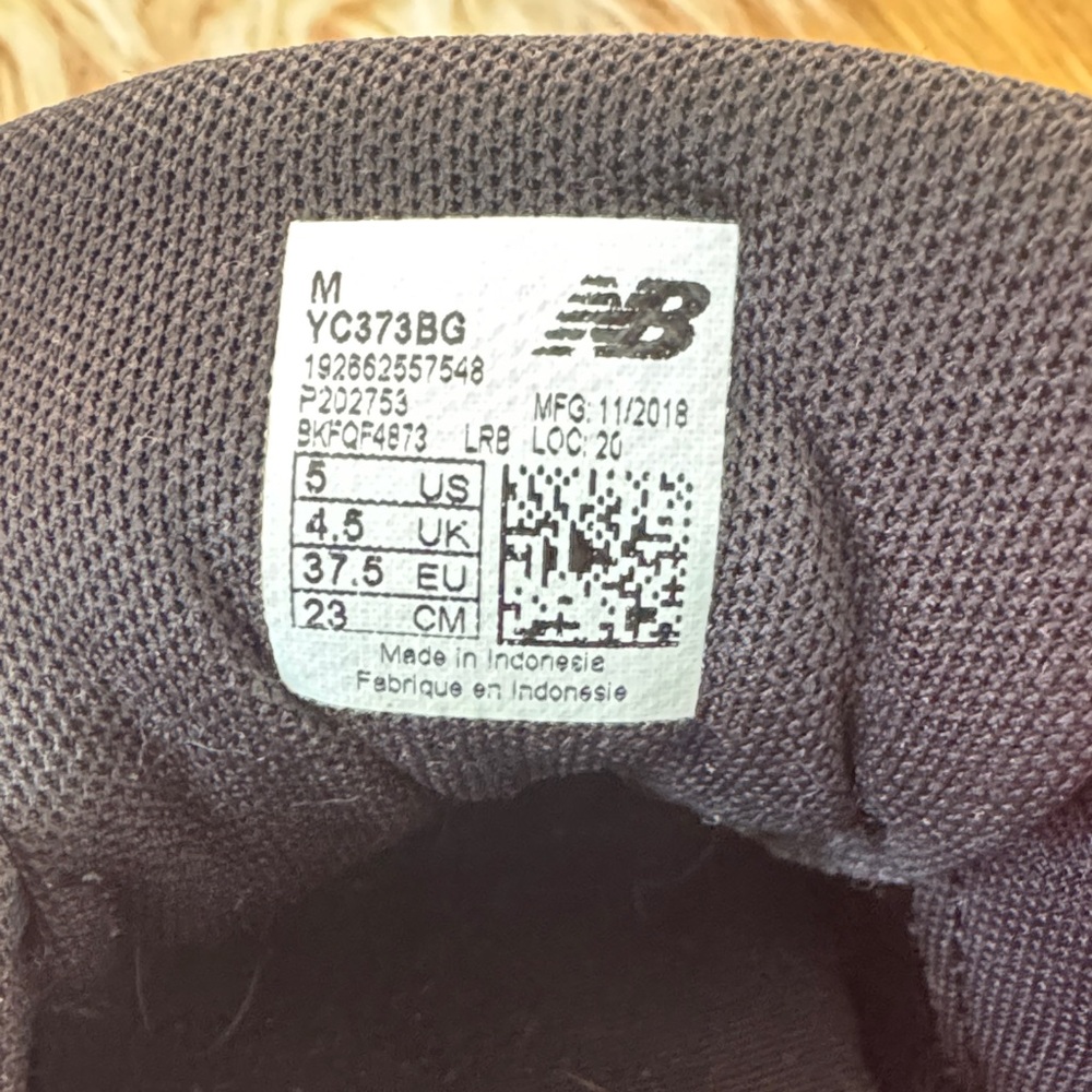 New Balance Black and White Athletic Shoes - Picture 3 of 9